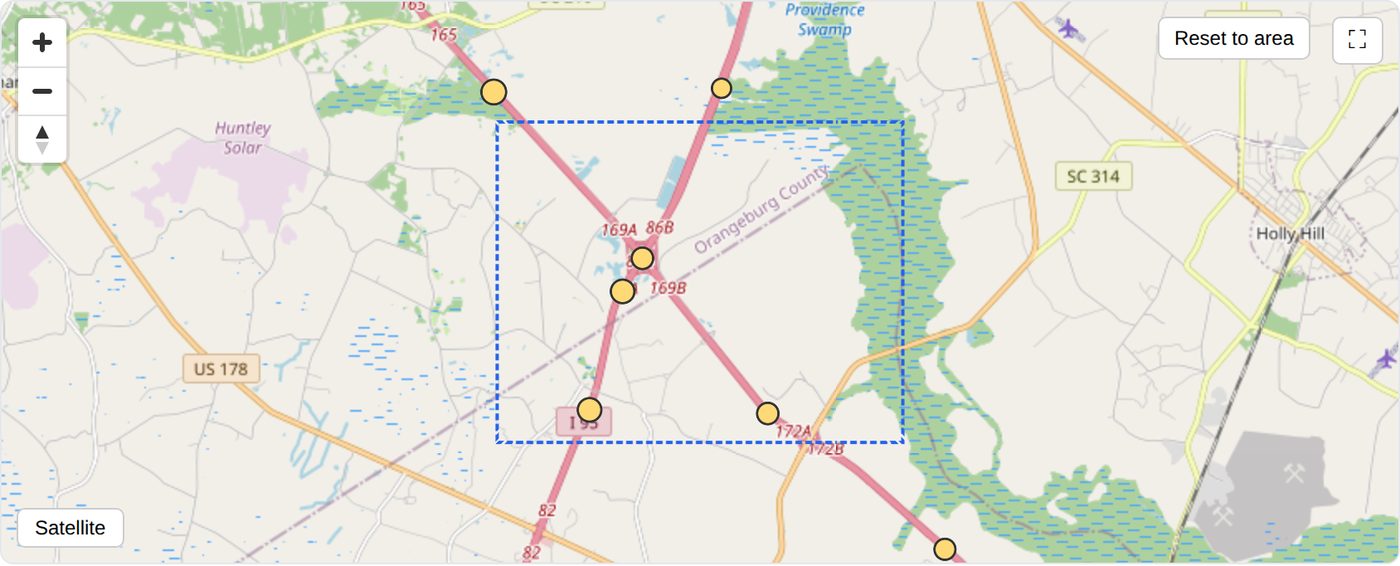 iVerify map of the I-26 and I-95 crossing north of St George: the interstate ramps carry only through traffic between I-26 and I-95, with no local arterial frontage into the quadrants and Four Hole Swamp floodplain to the east
